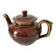 Vintage brown glazed earthenware teapot, mid-century sculptural decor.