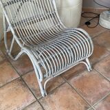 Vintage arched rattan armchair. 1970s.