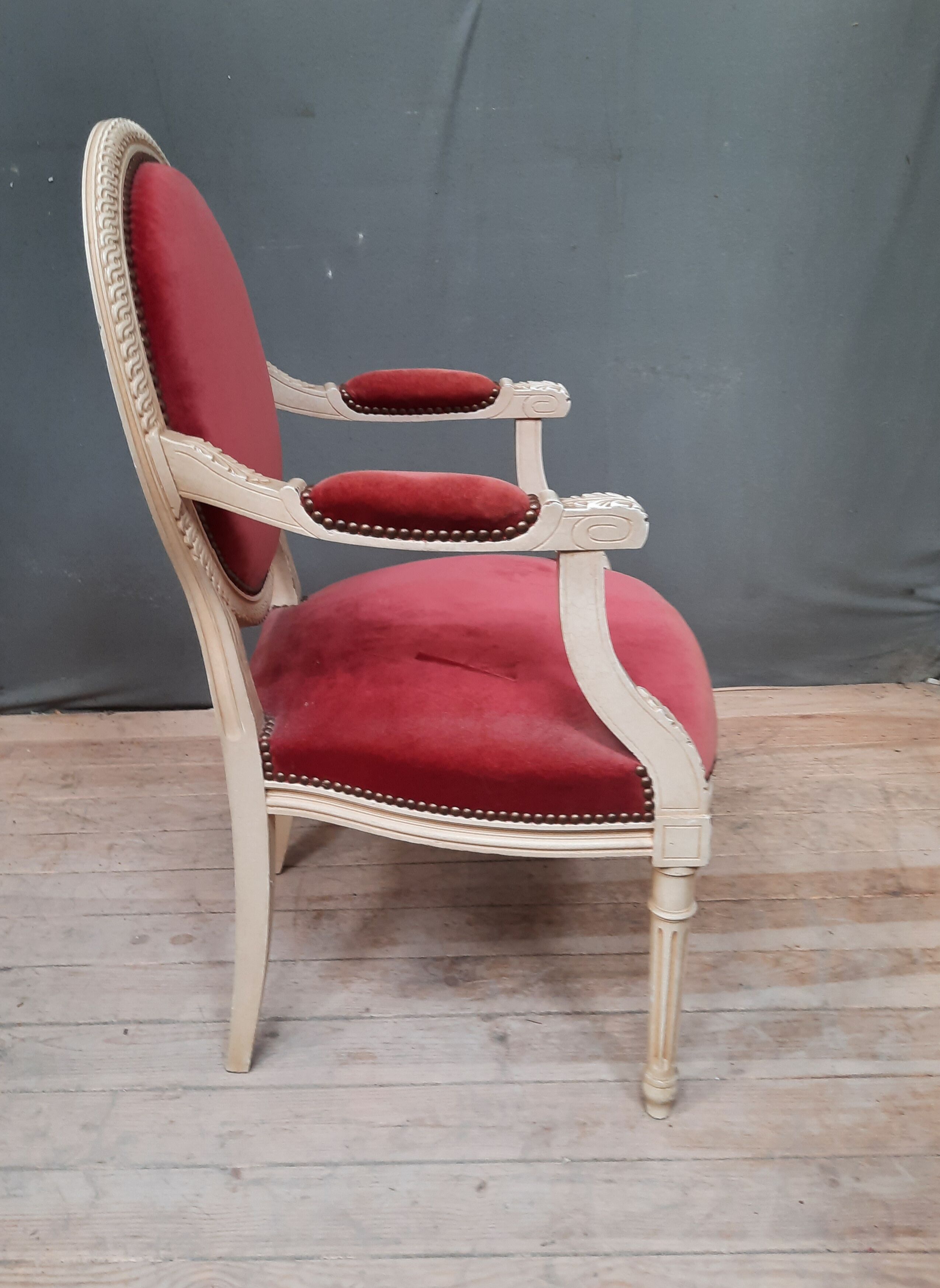 Louis XVI style armchair in white lacquered wood