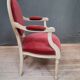 Louis XVI style armchair in white lacquered wood