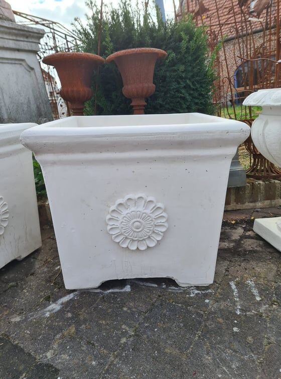 Contemporary reconstituted stone pot for the garden