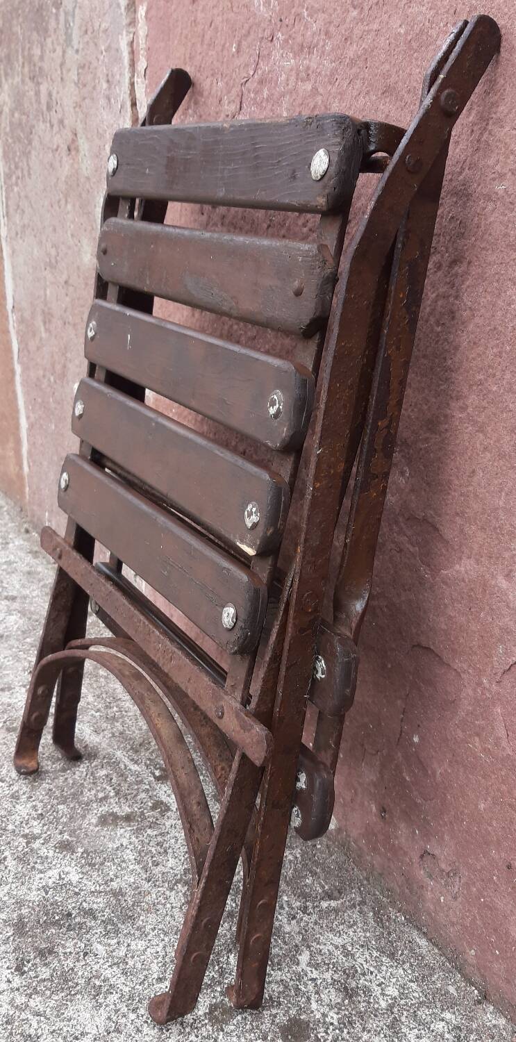 Foldable wrought iron chair