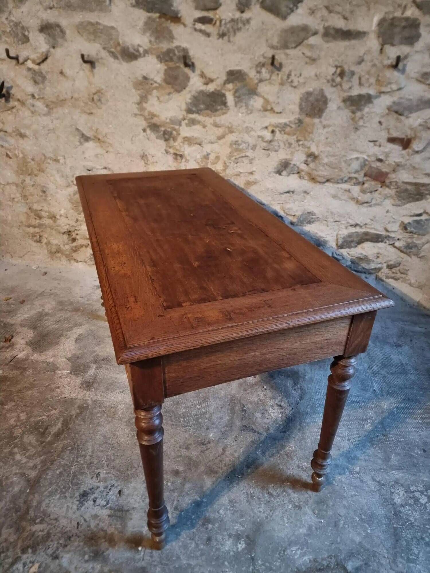 Antique French writing desk in oak with two drawers, 1920s.