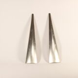 Minimalist triangular salad serving spoons by Jumbo.