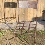 Series of 8 wrought iron garden chairs
