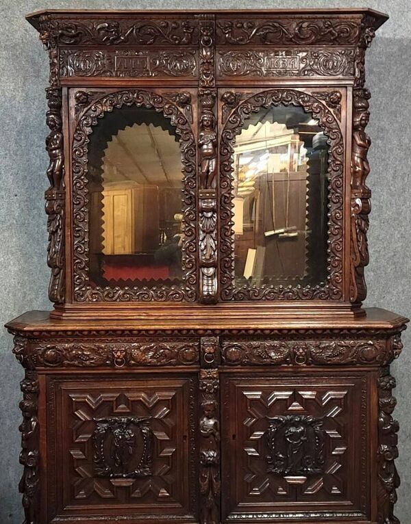 Grand buffet deux-corps style renaissance richement sculpté – « anno 1634 »