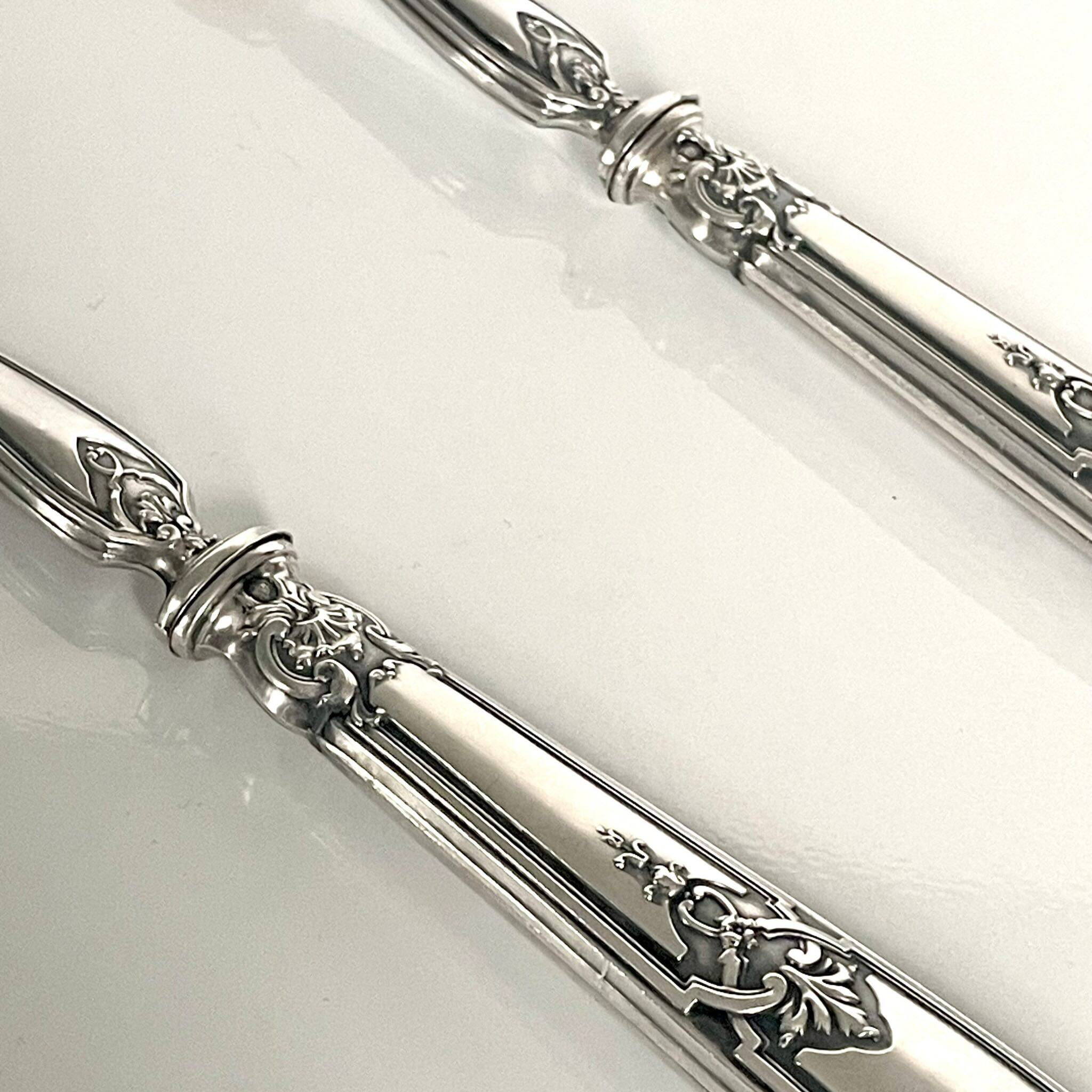 2 silver and horn salad servers