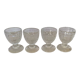 Four old molded glass shells