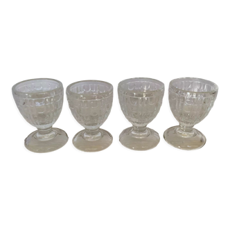 Four old molded glass shells