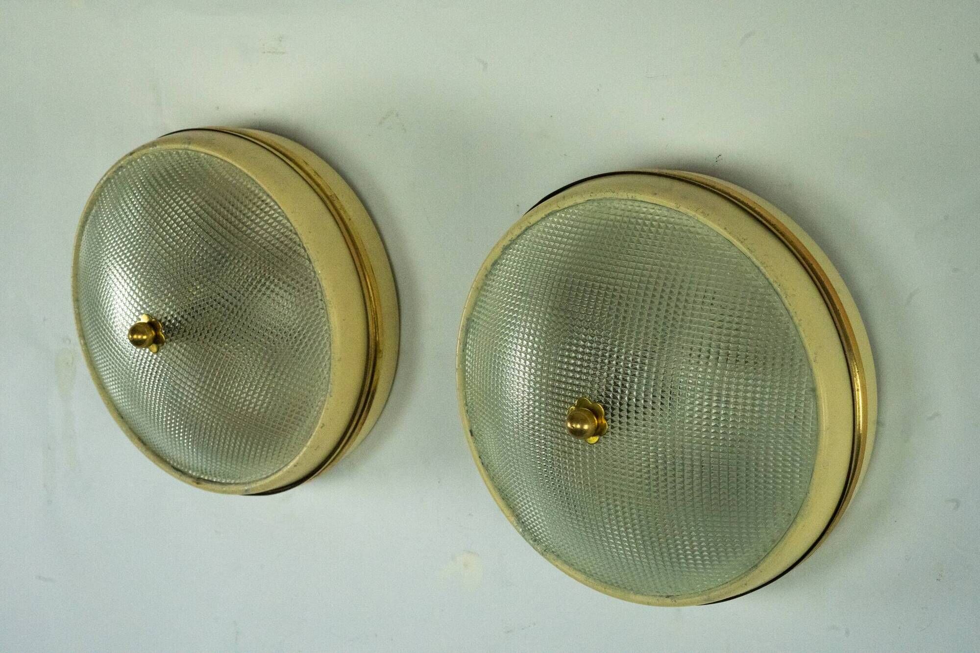 Lumi Milano, pair of wall or ceiling lamps in glass, brass and lacquer, 50s