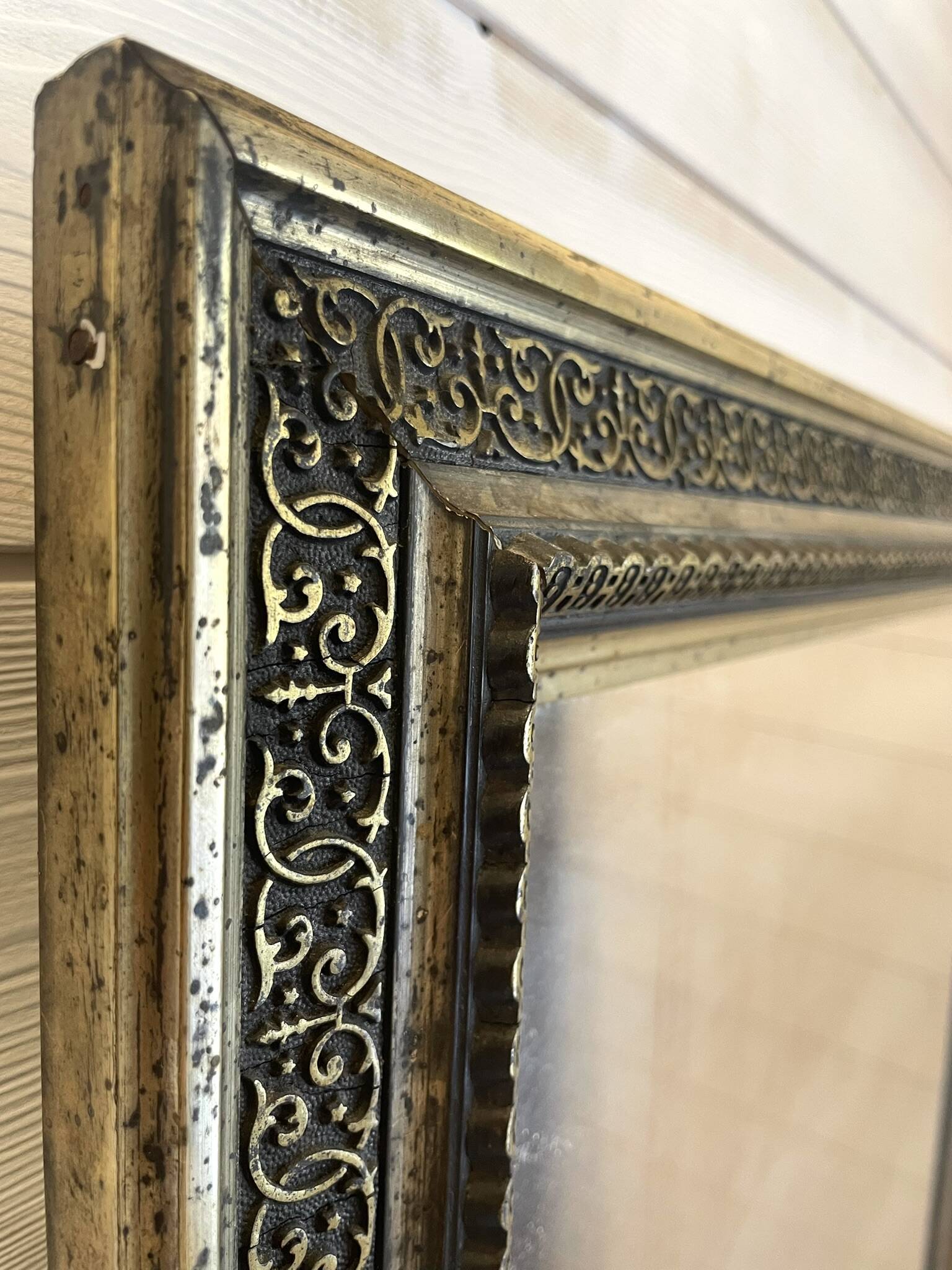 Large gilded antique mirror with moulding in the Napoléon III style.