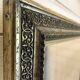 Large gilded antique mirror with moulding in the Napoléon III style.