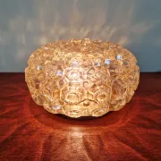 Amber glass honeycomb ceiling light, design by Helena Tynell, 1970.