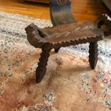 Old tripod milking chair