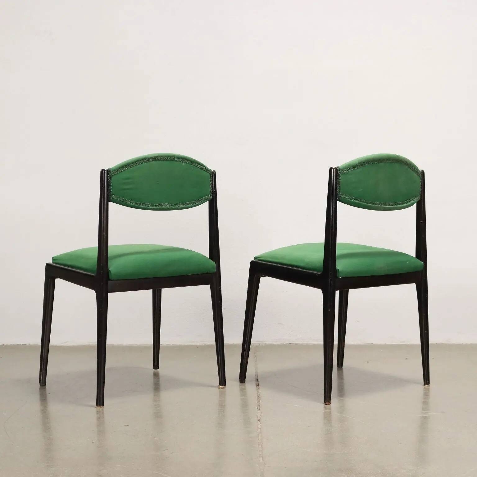 Vintage 1960s ebony wood chairs, foam padding, fabric.