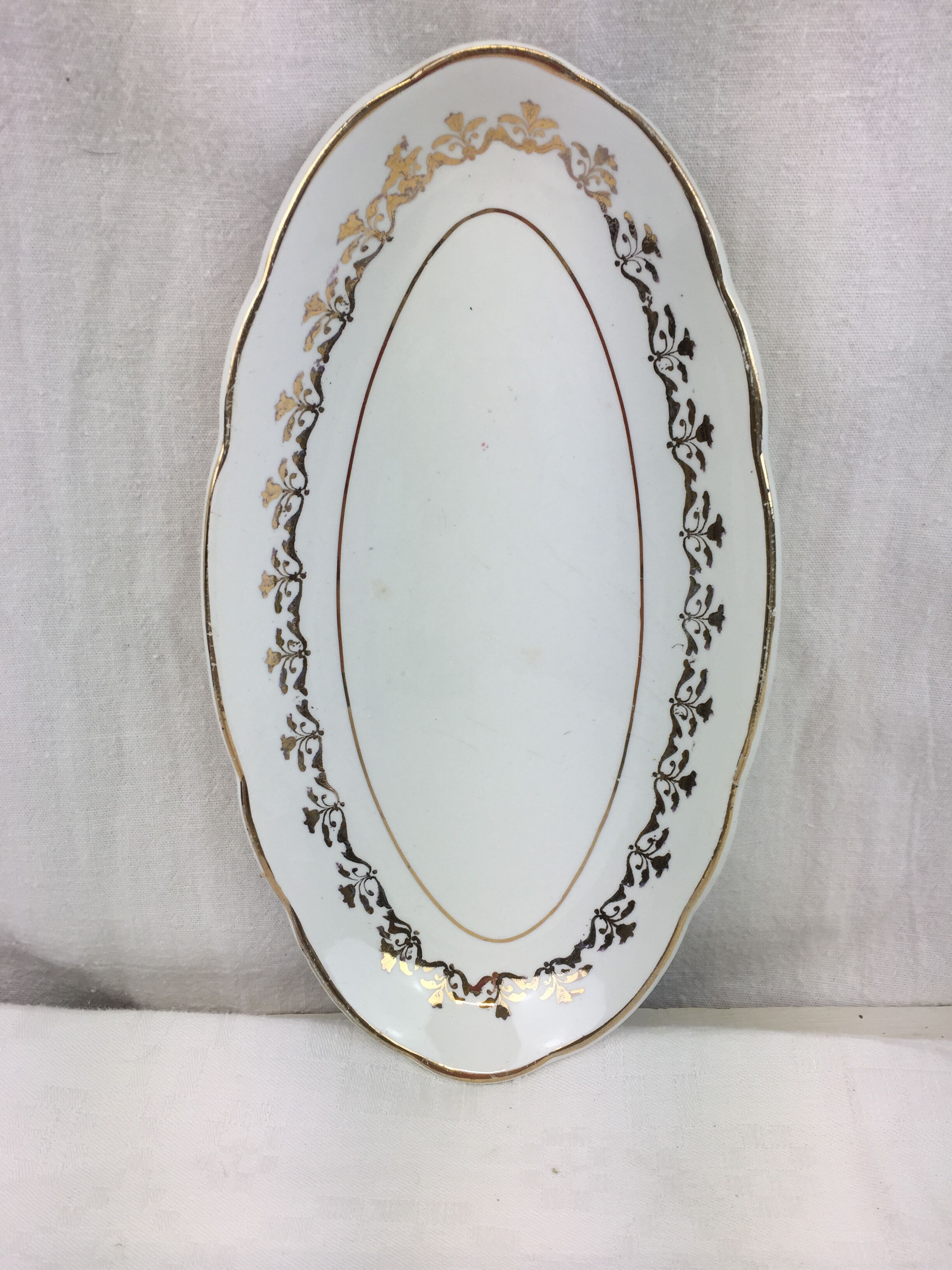 Antique oval shaped white and gold dish made in France Sarreguemines