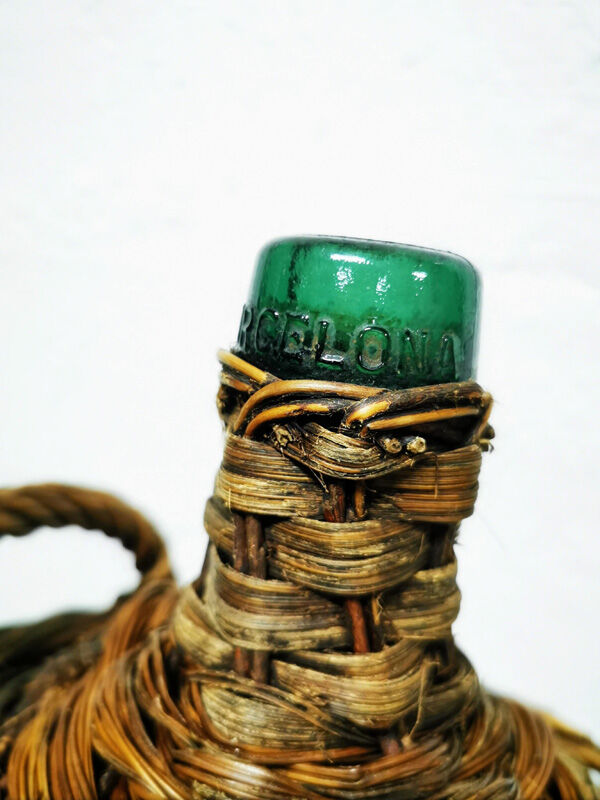 Demijohn dressed in wicker