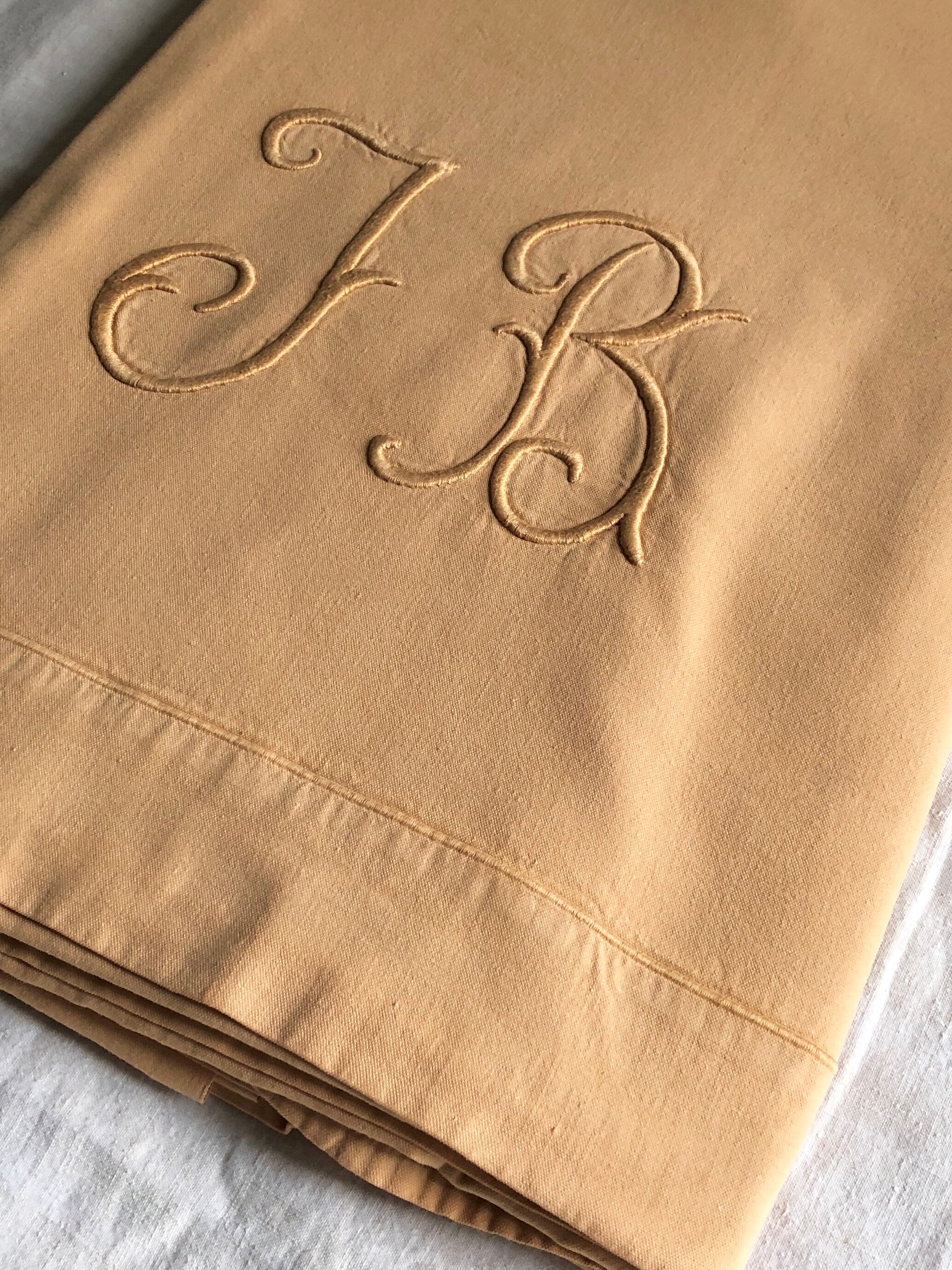 Old linen and yellow cotton sheet