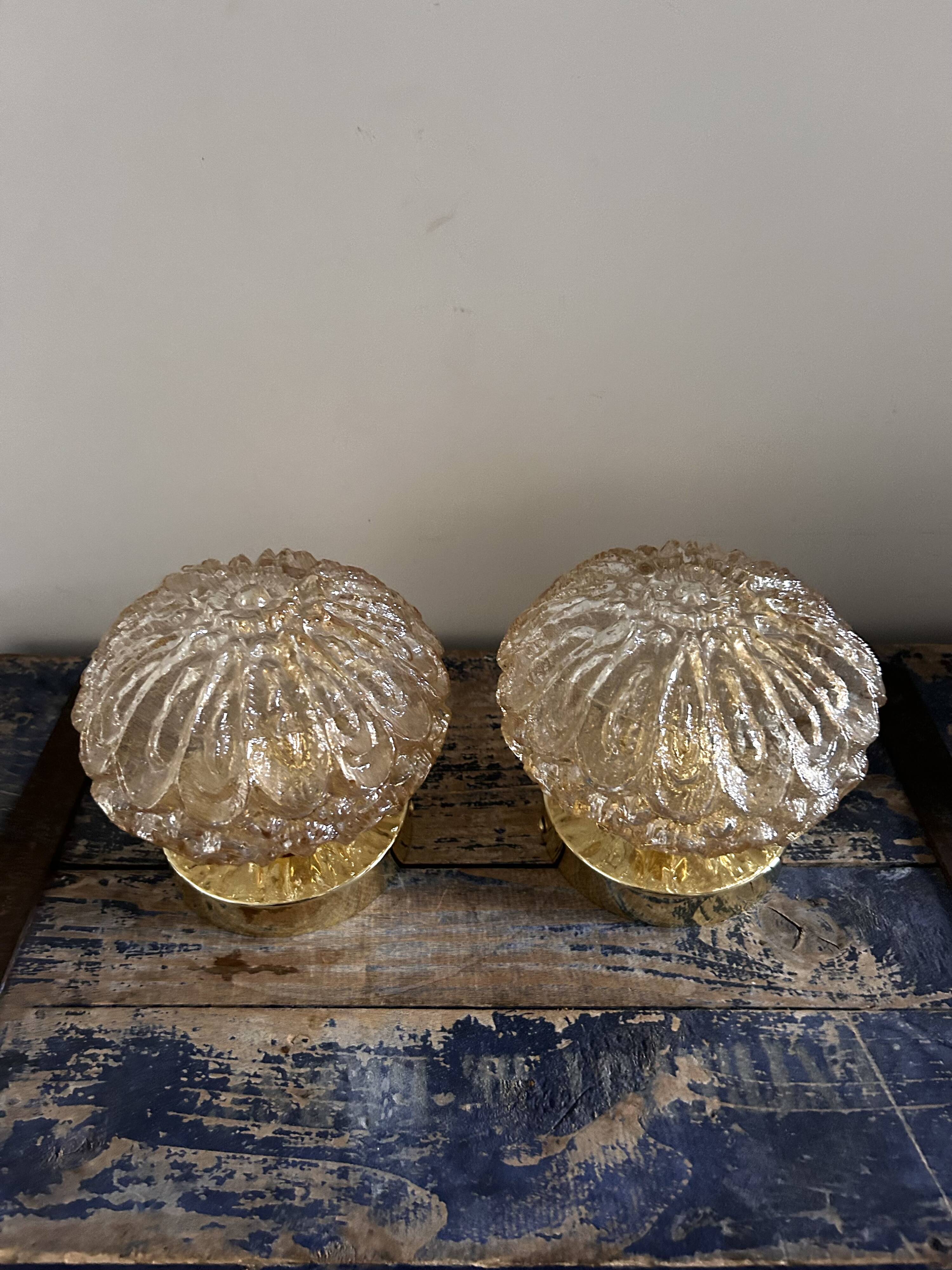Set of two vintage amber glass wall lights