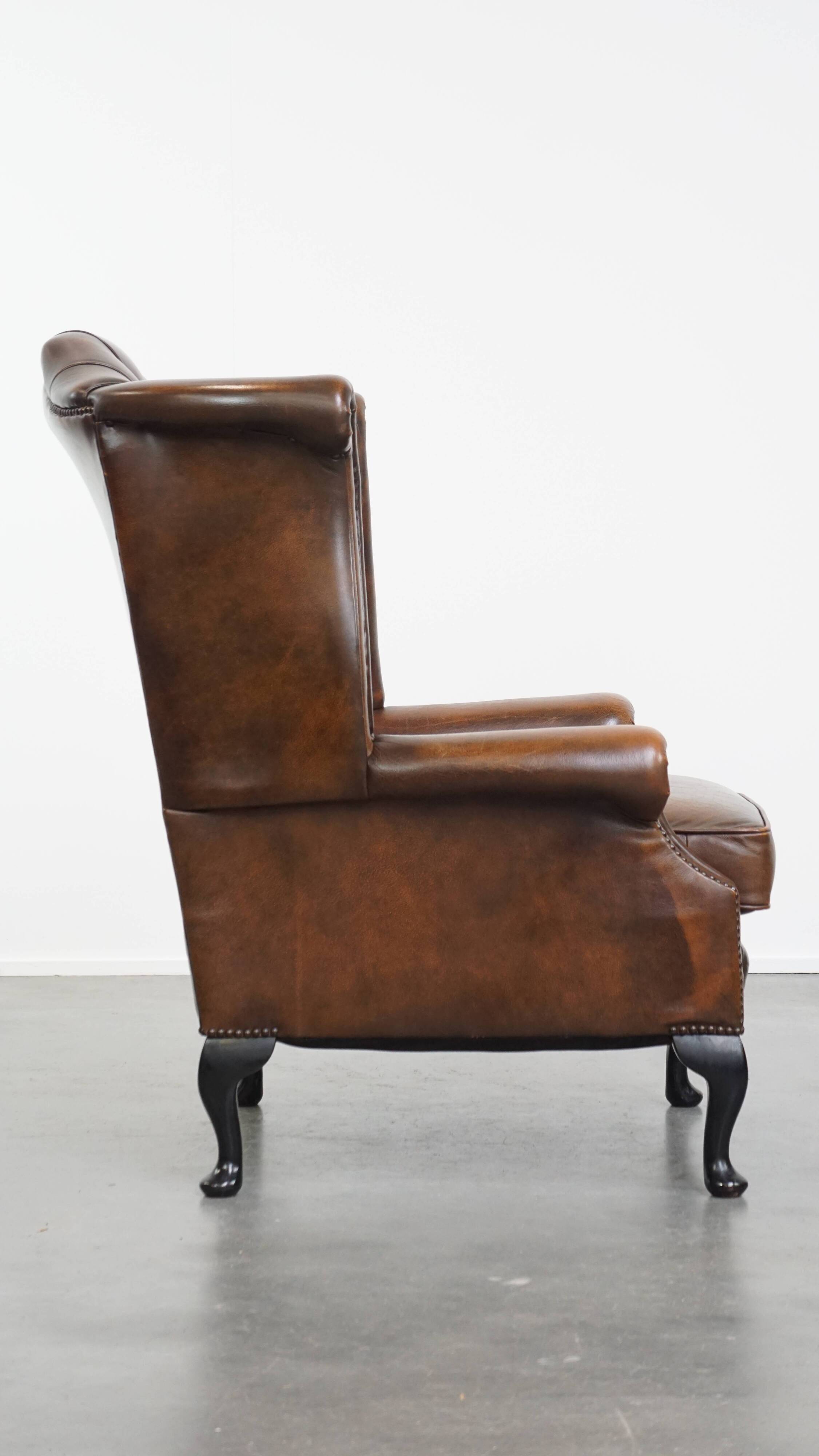 Fauteuil Chesterfield en cuir de vache marron de style anglais