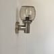 Pair of vintage wall lights, chromed metal and bubbled glass, France, 1960