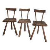 Set of three wooden tripod chairs in oak, raw art.