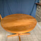 Table ronde en bois avec piétement style Baumann