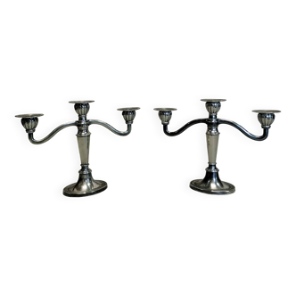 Pair of 2-branch metal candlesticks.