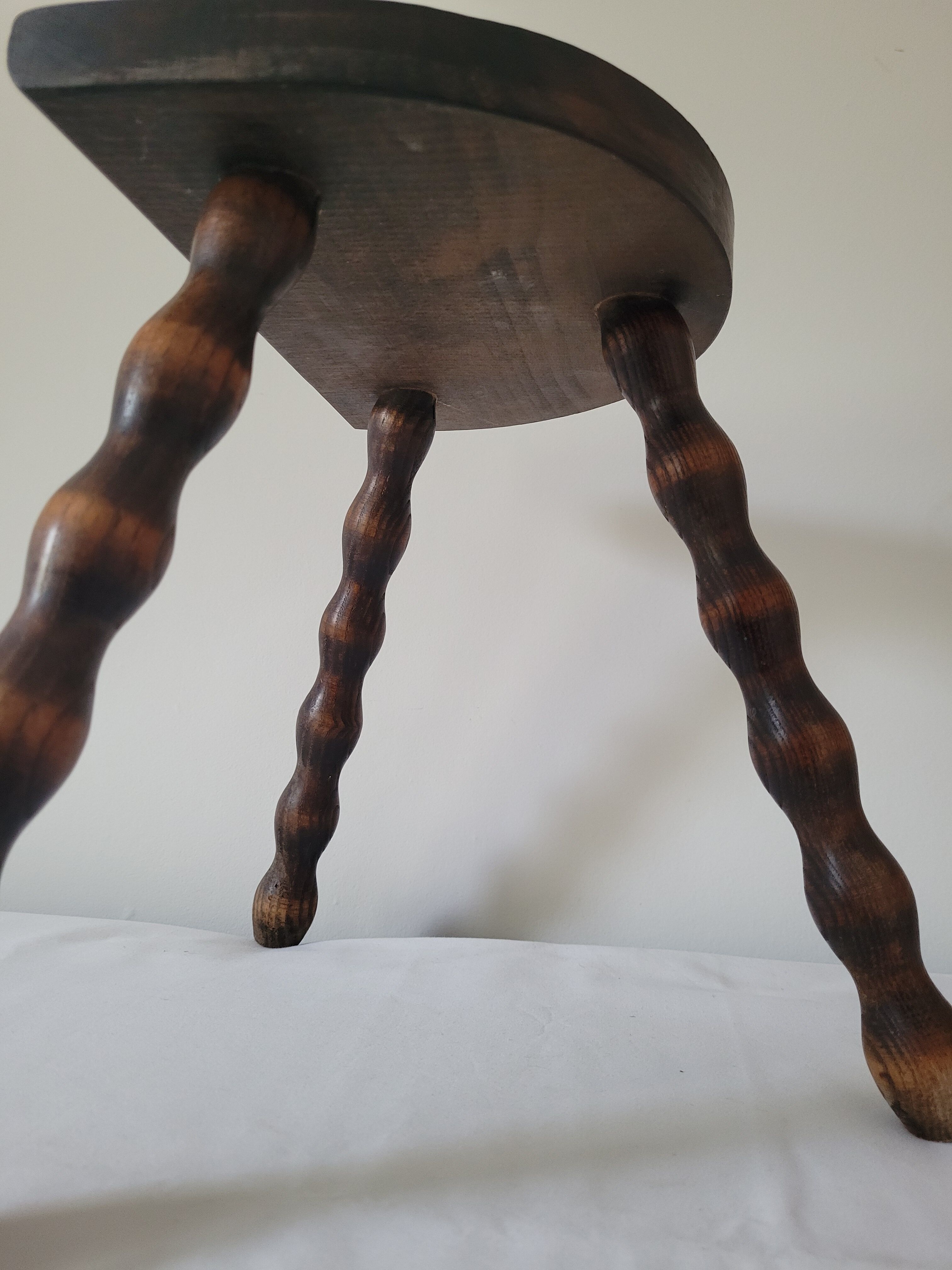 Tripod stool with turned wooden legs