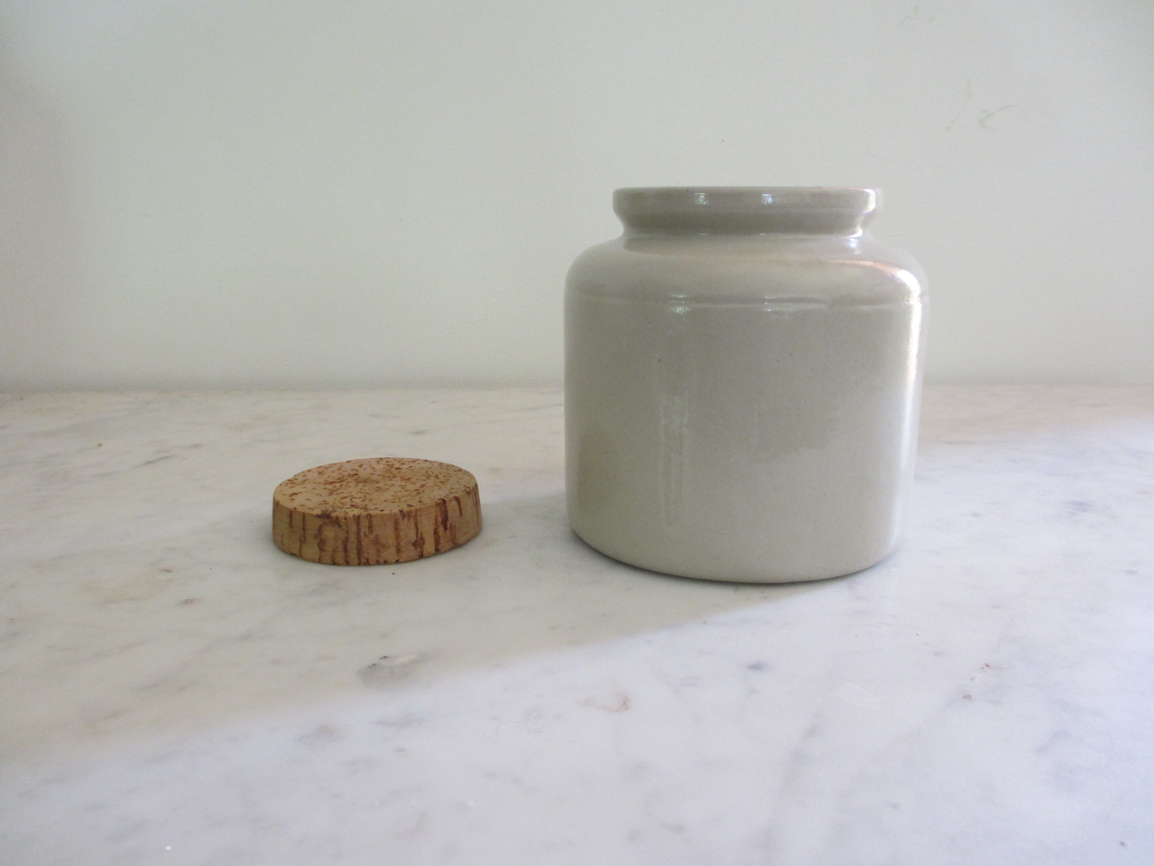 Sandstone pot with its cork cotted