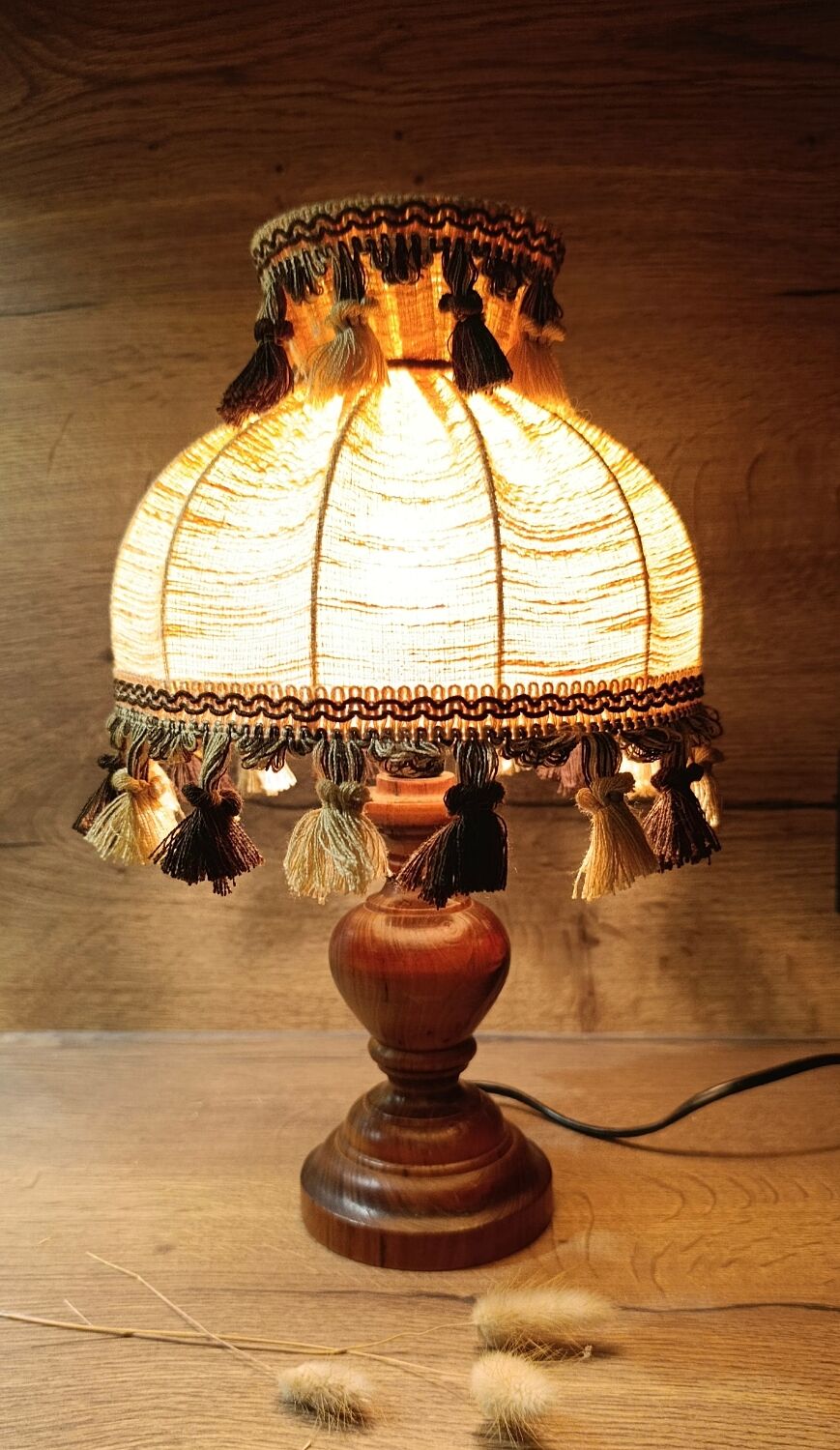 Wood bedside lamp with dome shade in granny chic style.