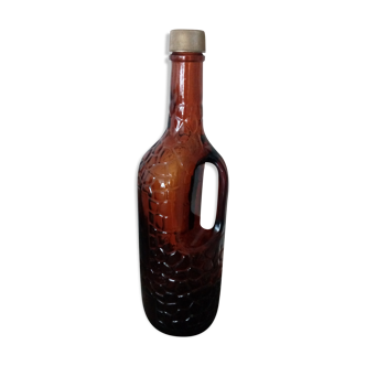 Bottle with amber glass handle