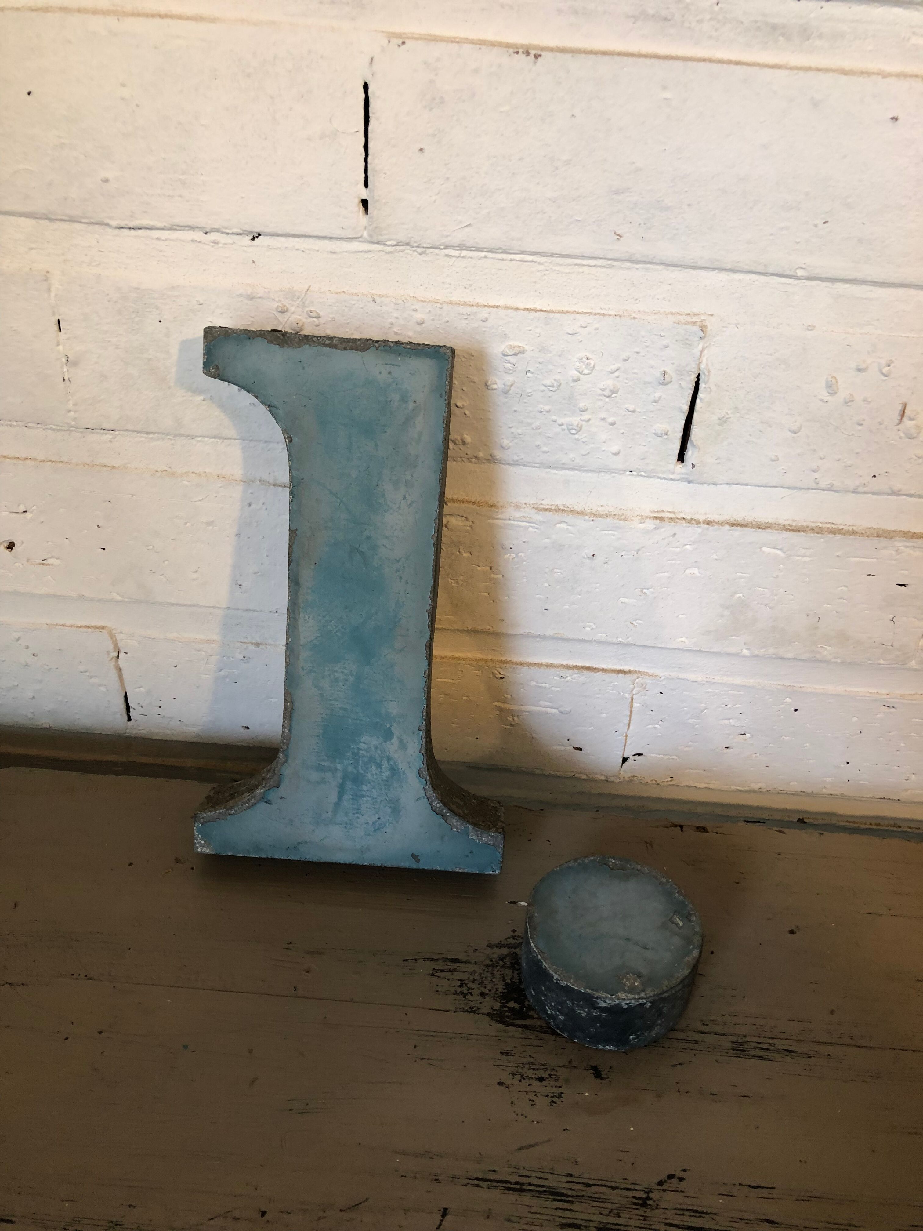 Blue sign letter "i"