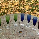Set of 7 champagne flutes in colored glass and transparent base, vintage