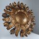 Large mid-century sunburst ceiling lamp, gilded metal with floral motif, 1950s