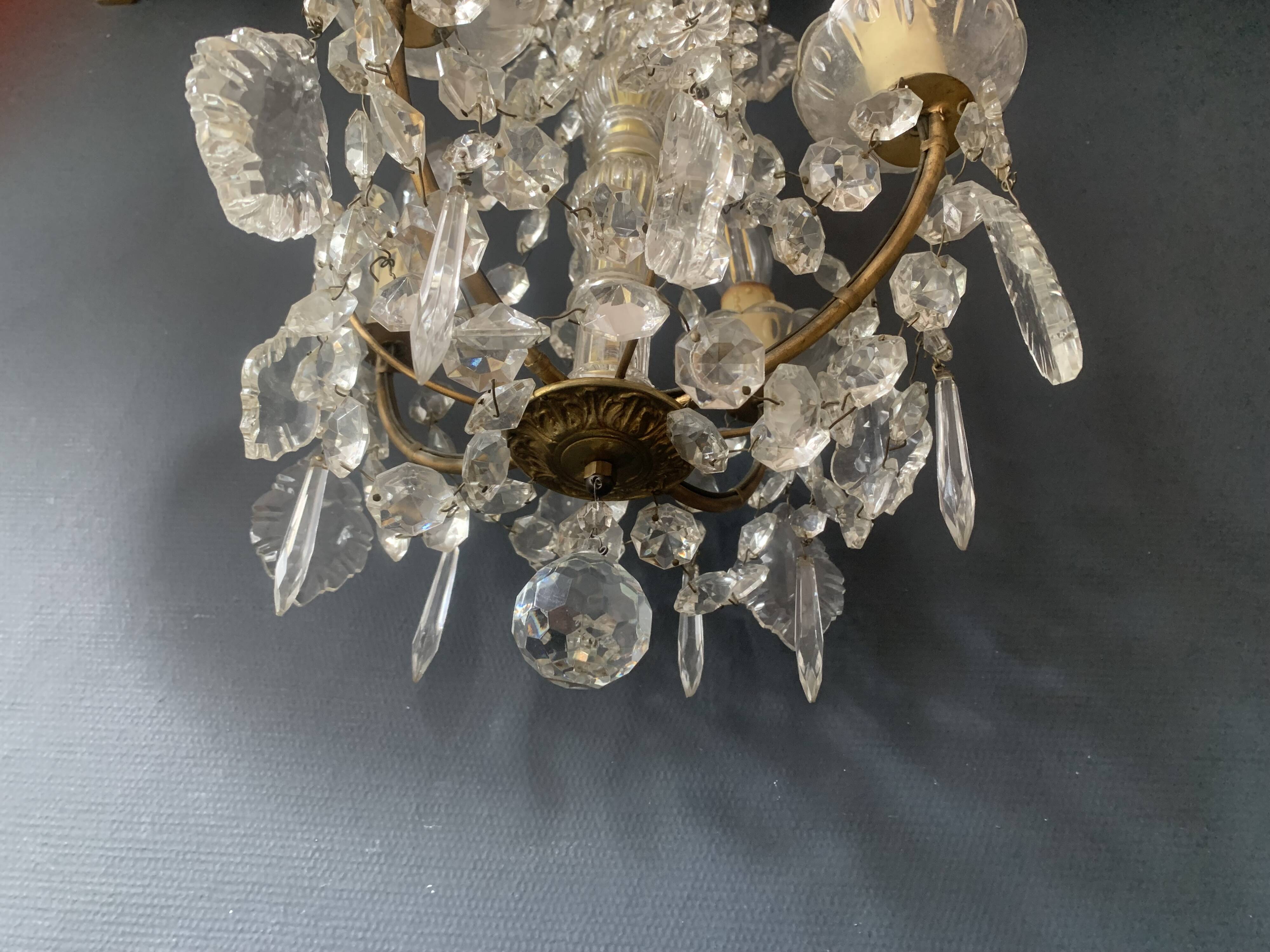 Small antique chandelier with tassels and bronze from the early 20th century