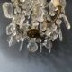 Small antique chandelier with tassels and bronze from the early 20th century