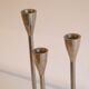 Pair of vintage candle holders in cast aluminum 1970