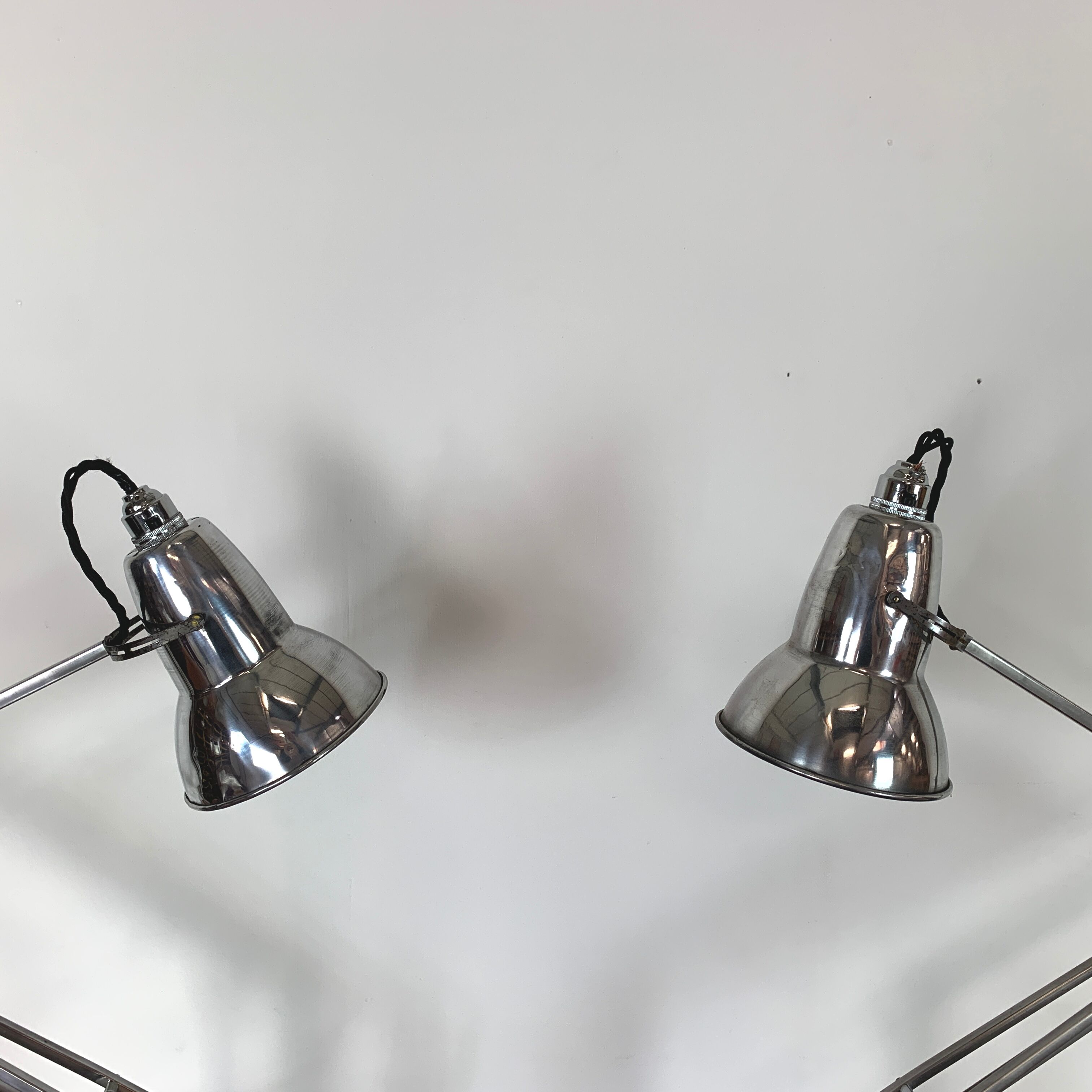Pair of vintage stripped and polished Herbert Terry anglepoise lamps