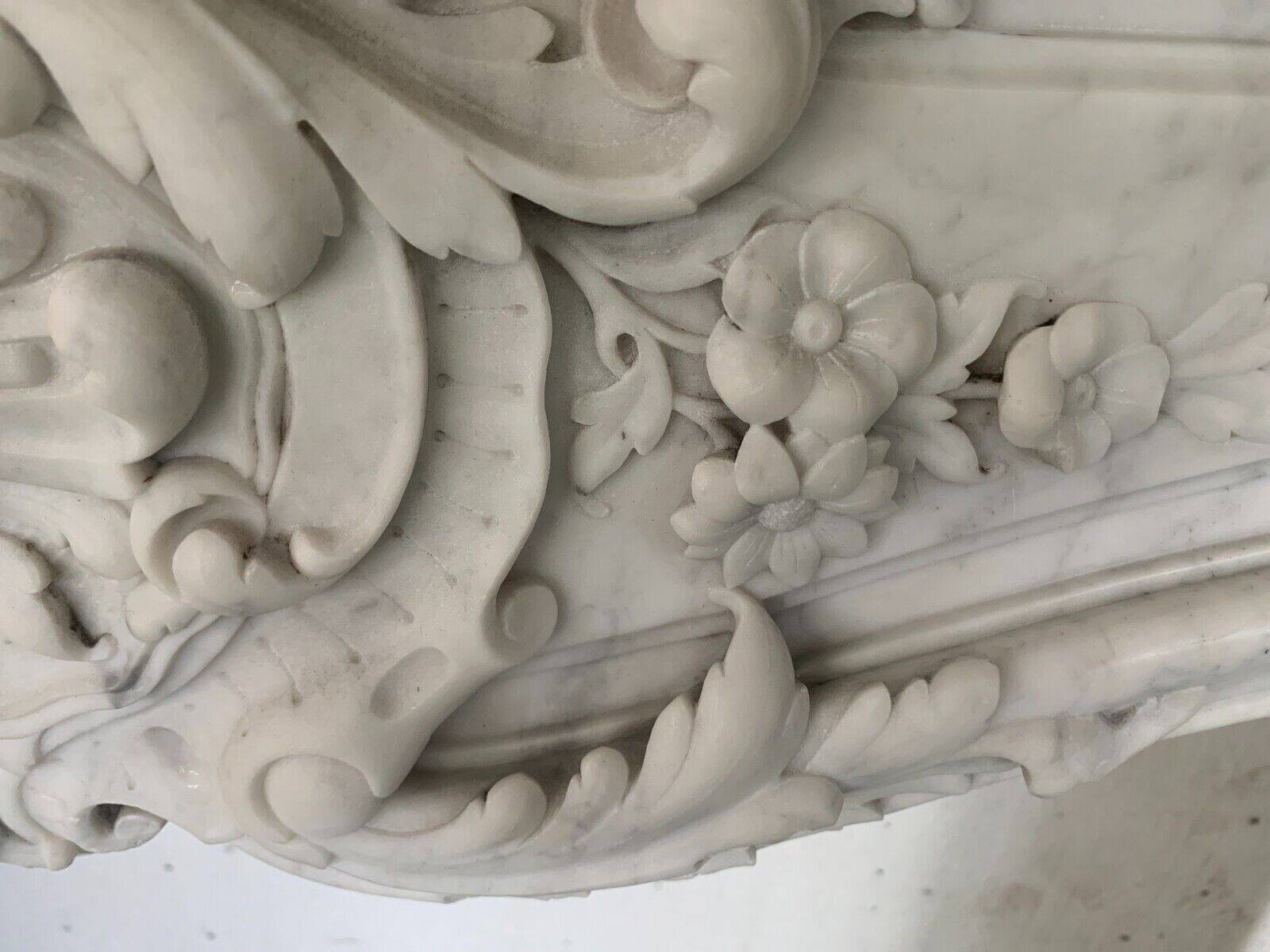Louis XV style fireplace in white Carrara marble 19th century