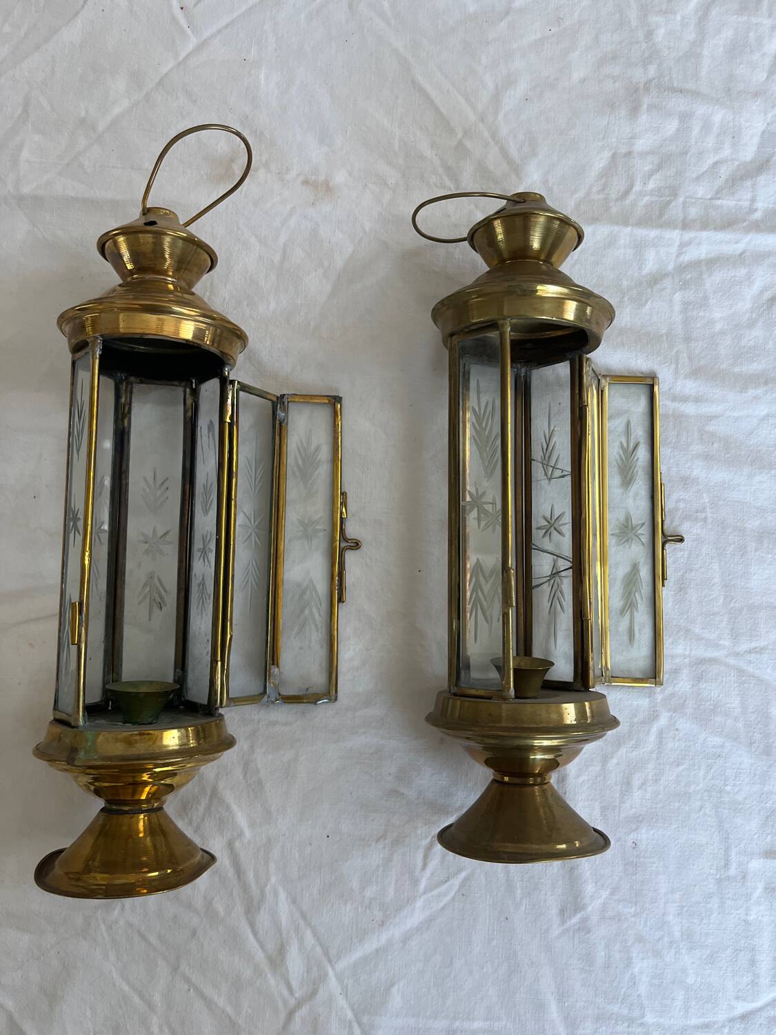 2 brass lanterns