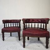 Pair of barrel chairs in turned wood and burgundy leather – Productio