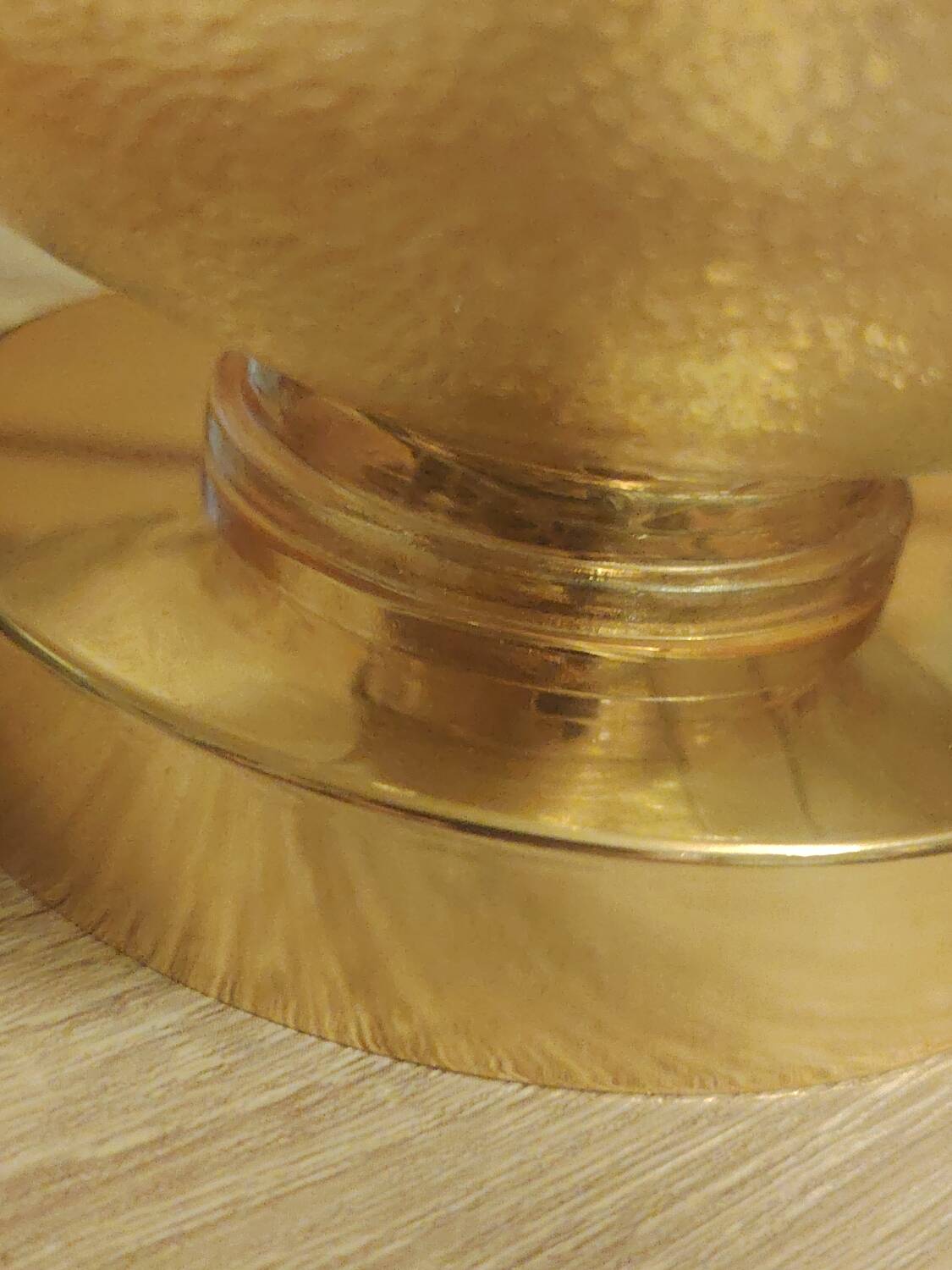 Textured amber globe wall light