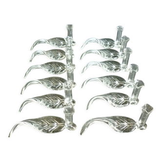 Series of 12 knife holders with integrated blown glass soliflores, sheet decoration