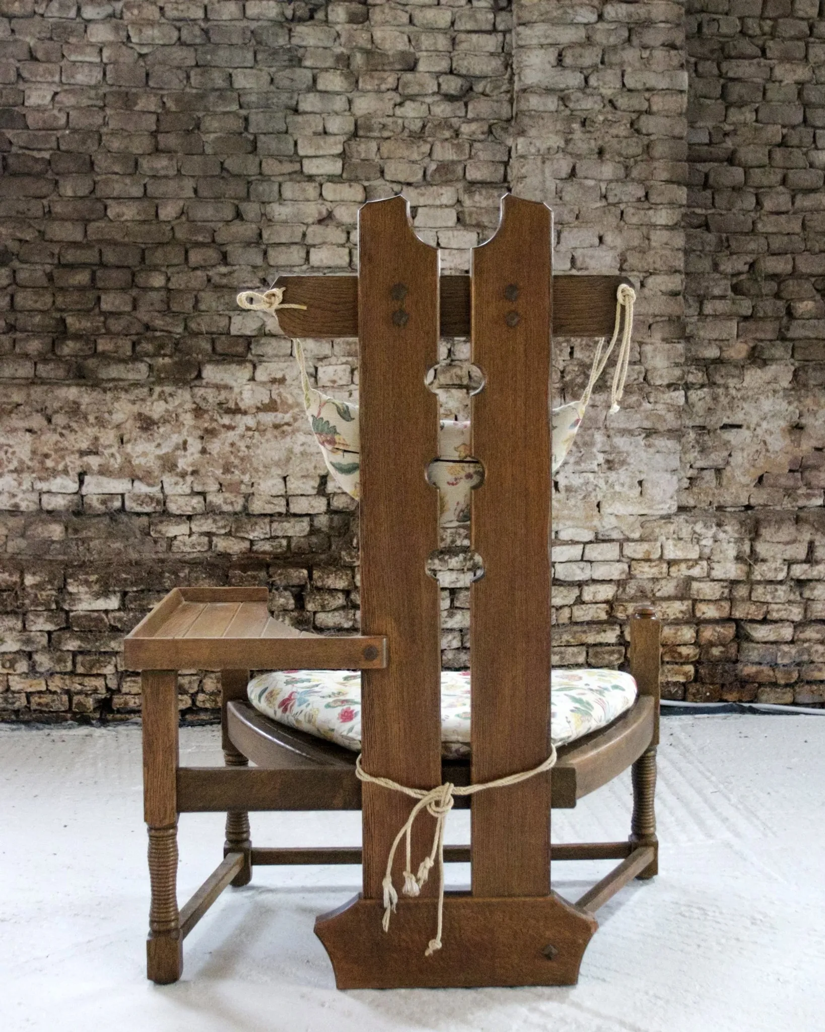 Rare Dutch brutalist oak armchair with integrated side table – 1950s