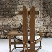 Rare Dutch brutalist oak armchair with integrated side table – 1950s
