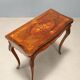 Game table in Indian rosewood and mahogany