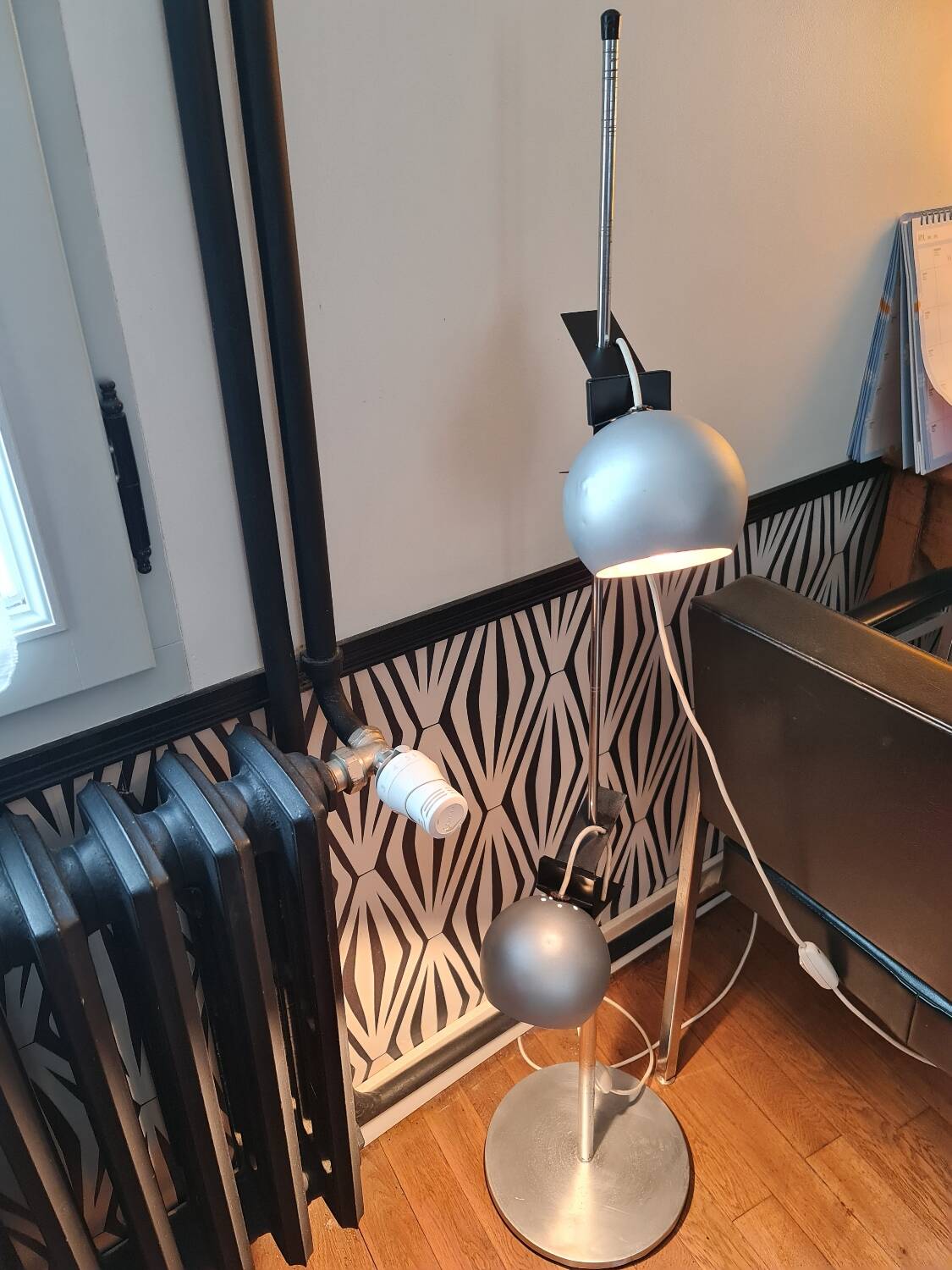 Two-light floor lamp with removable magnetic Eyes Ball.