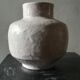 Vase covered white crusty and cracked ceramic,
