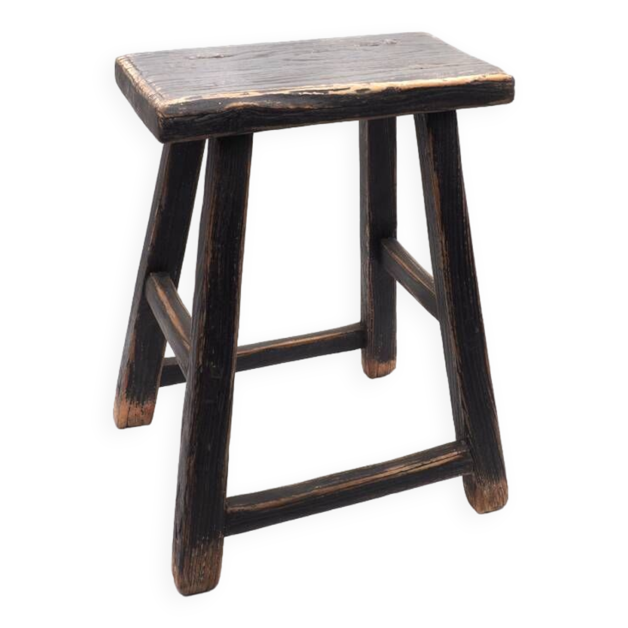 Rectangular stool in raw black elm.